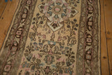 Intact side cord selvage alongside the meandering floral border of the Persian runner.