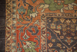 Distressed Mahal carpet with terracotta field, charcoal lotus vine border, and palmette motifs.