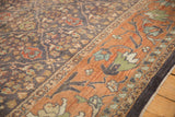 Distressed Mahal Carpet close-up: terracotta lotus border and charcoal palmette field details.