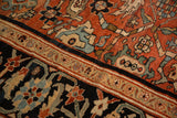 Partial Herati border and scrolled paisley motifs on an antique hand-knotted Sultanabad carpet.