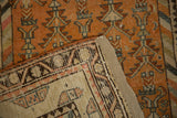 The hand-knotted back weave and restored fabric side of a vintage Persian Malayer runner.