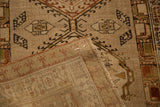 The hand-knotted back and secure machine-bound edge of a vintage Serab rug runner.