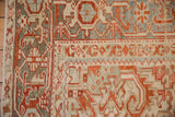 Worn texture of the Turtle Samovar border on a hand-knotted vintage Persian Heriz rug.