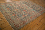 A vintage Persian Bibikabad carpet's allover floral design shown from a high-angle perspective.