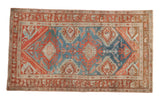 Vintage distressed Persian Hamadan rug with asymmetric medallions in sapphire blue and pomegranate red.