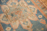 Detailed view of the even wear across the knot heads of a distressed Persian rug.