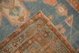 Low pile texture and geometric border detail on the folded corner of an antique Northwest Persian runner.