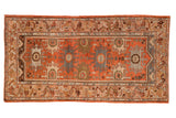 Vintage distressed Malayer runner with a terracotta field, stylized palmettes, and serpent motif borders. 3x6.