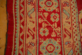 Restored side cord selvage and hand-knotted pile on a vintage Turkish Oushak carpet.