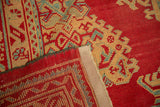 Restored side cord selvage and hand knotted construction on a vintage Turkish Oushak rug.