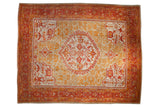 Antique Oushak carpet, oversized medallion with gold and red patterns on pale seafoam.