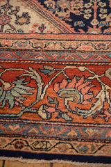 Hand-knotted vintage Mahal rug border with expressive madder red, navy, and blush floral scrolls.