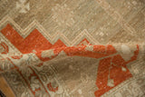 Ribbed texture of the distressed Malayer runner showing wear down to the knot heads.