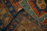 Antique Heriz runner corner showing the hand-knotted foundation and durable navy side cord.