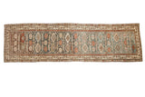 Distressed Malayer rug runner with dusty teal, terracotta serrated diamond medallions, 3'7