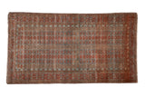 Distressed vintage Belouch rug with geometric blossoms in muted chestnut red and dusty teal, 3'1
