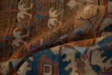 Folded view of an antique Bakshaish carpet showing its abrashed wool and hand-knotted texture.