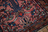 Serpent-like gul border with a rainbow of shades on a vintage hand-knotted Mehriban rug.