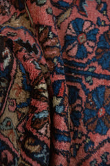 Soft wool pile and visible knot heads on a vintage hand-knotted Mehriban Persian rug.