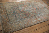 Distressed Bijar rug border, terracotta and blue Turtle Samovar motifs, mostly even wear.