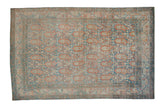 Distressed Persian Serbend rug with an allover boteh pattern in pale sapphire blue and terracotta rust.