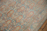 Angled view showing the mostly even wear and hand-knotted boteh pattern of the Serbend rug.