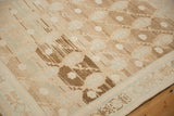 Vintage distressed Hamadan rug detail, abrashed coffee brown field, boteh, seed motifs, blue border.