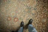 Distressed vintage Meshed carpet; dusty blue-green, terracotta floral palmettes, foundation visible.