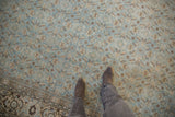 Detail of a vintage Tabriz carpet's time-softened pile with a Herati motif in denim blue and beige.