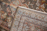 Distressed Gul Farang pattern in silver, rose, blue; detailed hand-knotted back weaving.