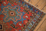 Close view of the even wear and intact side cord of a vintage Karaja rug.