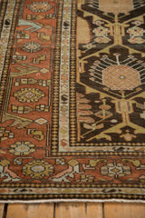 Low, even pile and intricate floral borders on a vintage Mehriban rug's corner.