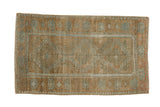 Vintage distressed Belouch rug with a triple medallion design on an abrashed coffee brown and powder blue field.