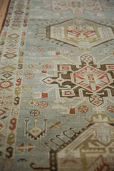 Close view of a vintage Karaja runner's distressed pile, highlighting its even, low-knotted texture.