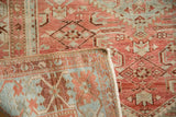 Hand-knotted foundation and distressed pile with white knot heads on a vintage Malayer rug.