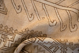 Textured, hand-knotted pile of a vintage Kars carpet showing wear down to the knot heads.