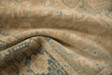 Close-up showing the low, hand-knotted pile and even wear of a vintage Karaja rug.
