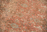 Distressed vintage Bijar pile with samovar panels and palmettes in blush, ivory, and slate blue.