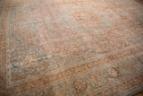 Distressed vintage Meshed carpet border with faded blue palmette and blossom motif.