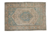 Vintage distressed Hamadan rug with a serrated hexagonal medallion in dusty sky blue and beige.