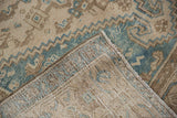 Reverse view of a vintage Hamadan rug showing the hand-knotted foundation and intact side cord.