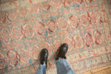 Mostly even wear across the knot heads of this distressed Persian Mehriban rug.