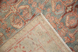 Hand-knotted back and secured corner of a vintage Mehriban Persian rug.