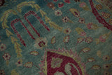 Time-softened tones and worn pile texture on a vintage hand-knotted Persian Meshed rug.