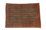 Antique Senneh rug, banded field of intricate motifs in faded red, brown, ivory.