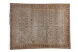 Vintage distressed Mahal rug with a geometric trellis design in pale rust, ivory, and powder blue.