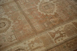 Evenly worn pile on a distressed Persian Afshar rug with sandalwood and coffee brown tones.