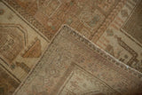 Close-up of the vintage Afshar rug's back, revealing the hand-knotted weave and side cord.