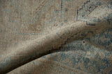 Textural view of the distressed Afshar rug's low pile worn to the foundation.