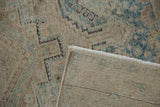 Hand-knotted foundation and intact side cord selvage of a vintage distressed Afshar rug.